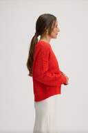 Women's pointelle knit sweater in Tomato
