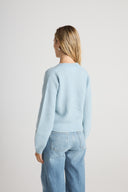 Women's Relaxed Fit Cashmere Ribbed Cardigan Sweater in Light Blue | Side View